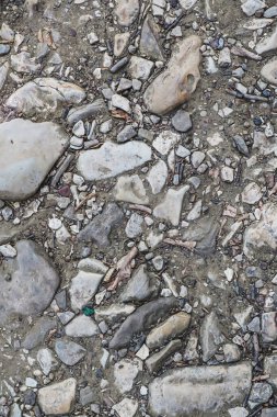 Arka plan ve tasarım konsepti için eski taş geçit dokusu. Üst Manzara. Düz yat. Dikey yönelim