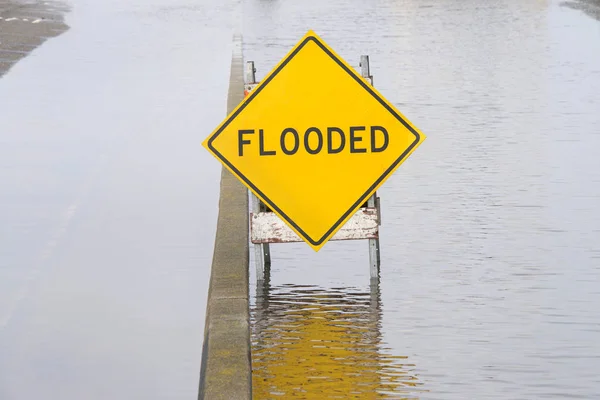 Flooded Sign Middle Standing Water Road Adjacent Parking Area — Stock Photo, Image