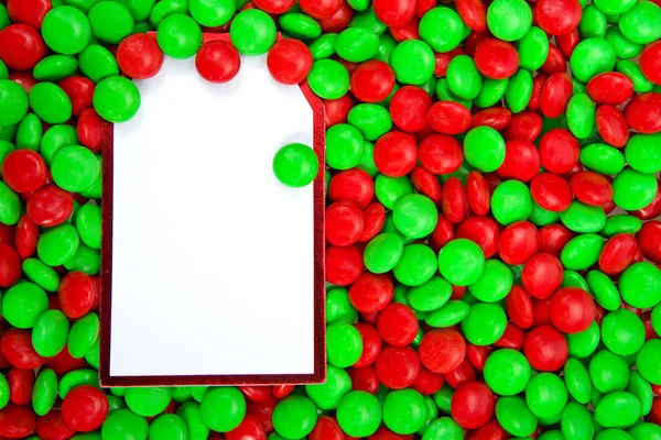 Фон Червоних Зелених Цукерок Шоколадними Частуваннями Білою Карткою Вертикально Лівій — стокове фото