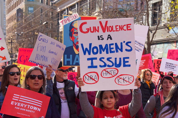 San Francisco, CA - January 20, 2018: Unidentified participants in the Women's March. Designed to engage and empower all people to support women's rights, and to encourage vote in midterm elections.