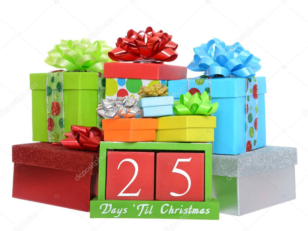 25 Days until Christmas red wood blocks in a green box with presents stacked on and around it isolated on a white background.