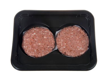 Sebze bazlı hamburger köftesi paketi, beyaza izole edilmiş. Marketin et reyonunda satılan ilk bitkisel burger..