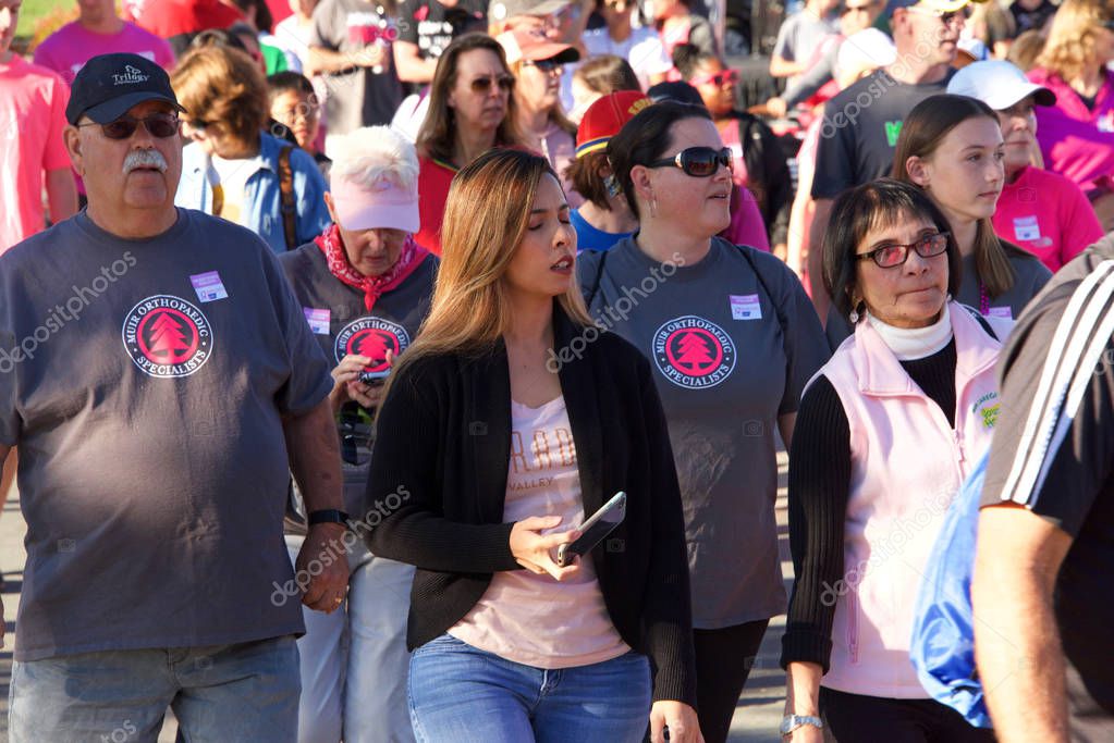 Walnut Creek, CA - Oct 06, 2019: Unidentified participants at the Avon 5K Breast Cancer Walk for a Cure event. Avon has been at the forefront of the fight against breast cancer since 1992.