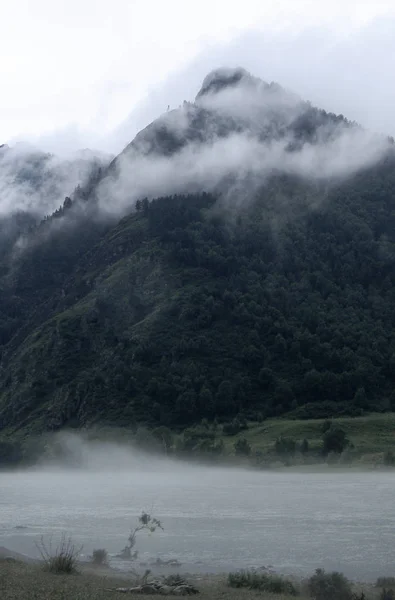 Fog in the mountains of the Altai Mountains