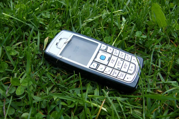 Old ancient phone of popular brand — Stock Photo, Image