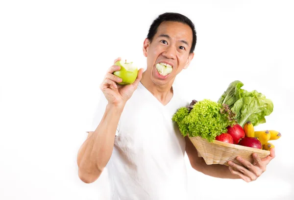Picture Asian Man Eating Apple Carrying Healthy Fruits Vegetables White — Stock Photo, Image