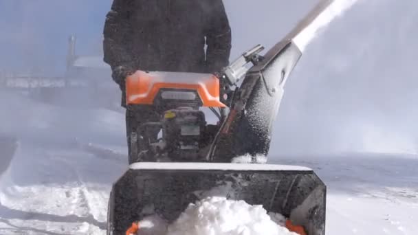 Cleaning of the territory with a snow removal machine. — Stock Video