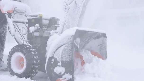 Work of a self-propelled snow blower — Stock Video