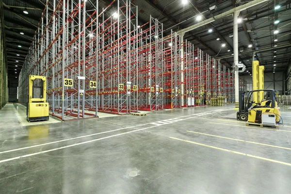 front loaders inside the warehouse