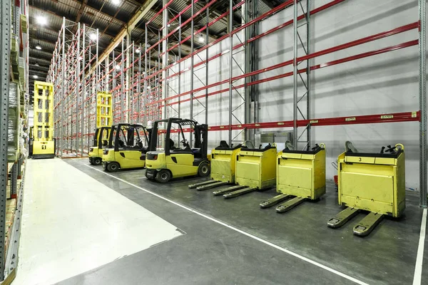 front loaders inside the warehouse