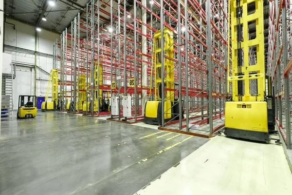 front loaders inside the warehouse