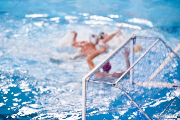 Unfocused image of a water polo match