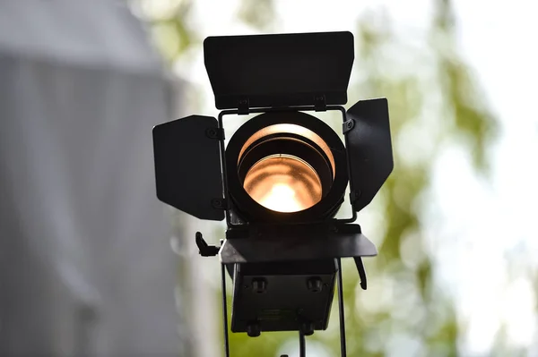 Outdoor shot with a professional lighting projector