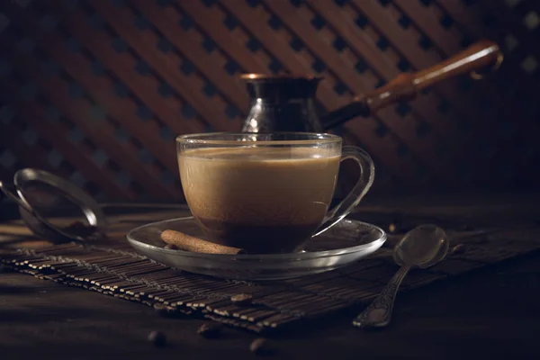 Cup of black coffee on the table with cream — Stock Photo, Image