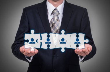 HR - insan kaynakları - iş kavramı ile el işadamı ve bulmaca