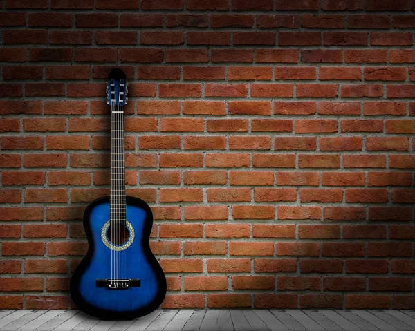 Akustisk gitarr tegel bakgrund wall shadow — Stockfoto