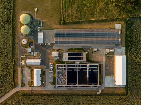 Waste-water treatment plant in sunset lights