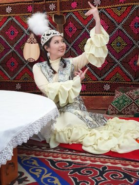 portrait of young woman in kazakh national dress  clipart