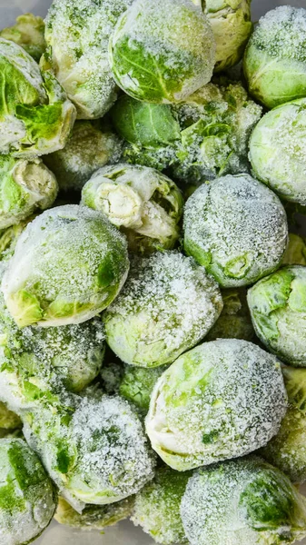 Fresh Frozen Brussels Sprouts Background Stocking Vegetables Winter Storage Texture — Stock Photo, Image