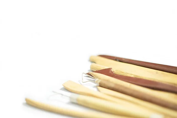 Pottery tools closeup isolated on white background, selective fo — Stock Photo, Image