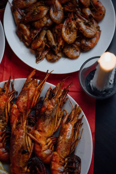 Shrimps Lobster White Plates Lemon Red Tablecloth Candlelight — Stock Photo, Image