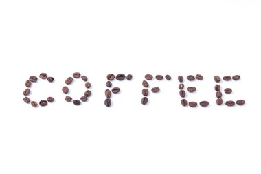 Kahve çekirdeklerinden yapılmış yazıt, kahve kelimesi. Kahve yazısı.