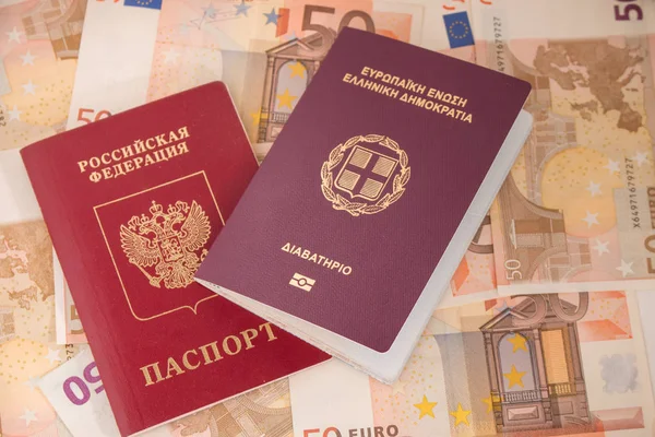 Passports Banknote Background Russian Greek Passports Euro Banknotes Fifty Traveling — Stock Photo, Image