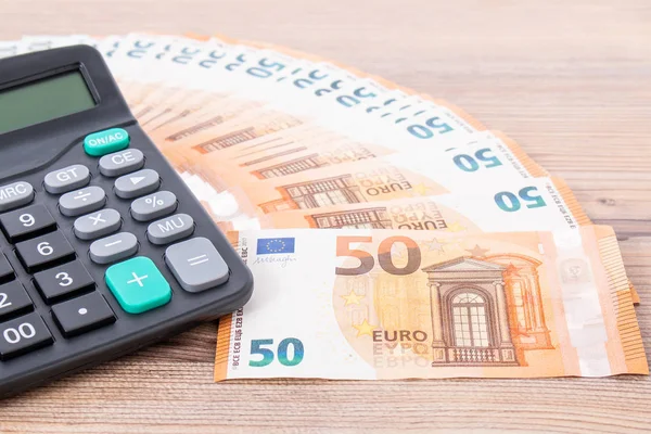 Calculadora Dinero Euros Sobre Fondo Madera Copia Espacio Para Texto — Foto de Stock