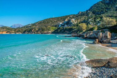 Voulisma plajı, Istron, Girit, Yunanistan 'ın tropik plajı. Temiz suyu olan güzel renkli plaj Voulisma Cenneti plajı. Yaz tatili tatil geçmişi 