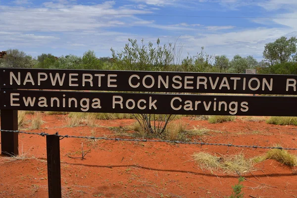 Australia, NT, sign for public Ewaninga Conservation Reserve, area with prehistoric engravings and Aborigines historical site,