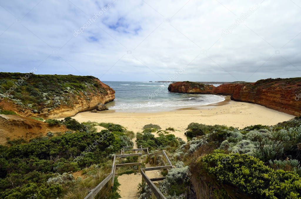 Australia, VIC, footpath to beach on Bay of Martyrs in Port Campbell national park on Great Ocean Road, preferred tourist attraction and travel destination,