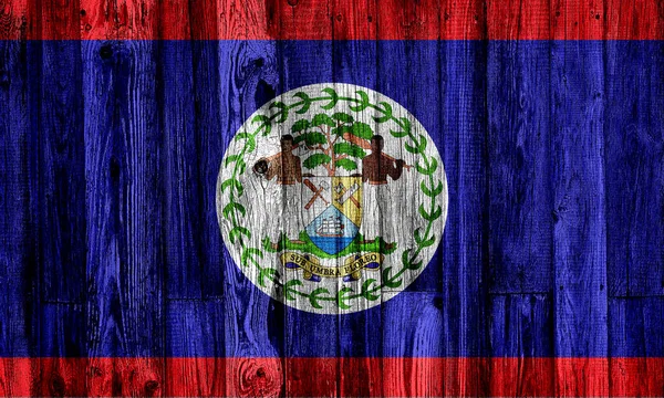 Vlajka Belize malované na grungy dřevěné prkno pozadí — Stock fotografie