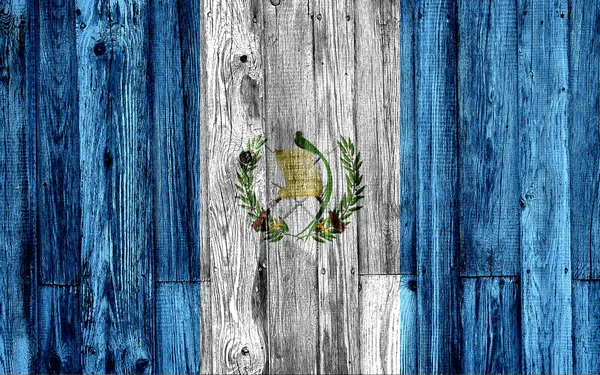 危地马拉国旗画在粗壮的木板背景上 — 图库照片