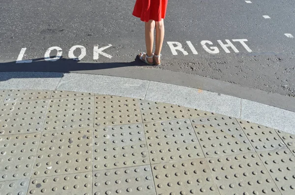 Pedestrian Standing Next Typical Road Crossing Sign London — Stock Photo, Image