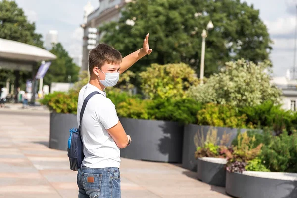 Teenager Greets Someone Wave His Hand While Walking Scooter His — Stock Photo, Image