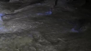 tourists in cavern, Cernica, Slovenia, underwater river, cave, grotto, dark, people, rock, stone, underground river,