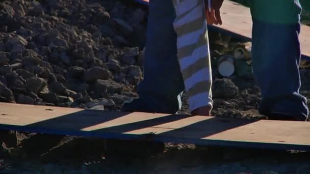 Man Hand Puts Stone Wooden Tablet — Stock Video