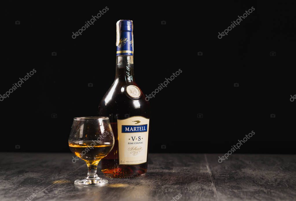 Kiev, Ukraine - 07 November 2018. Bottle of Martell Cognac, a brand founded in 1715 by Jean Martell, now owned by French wines and spirits conglomerate Pernod-Ricard.