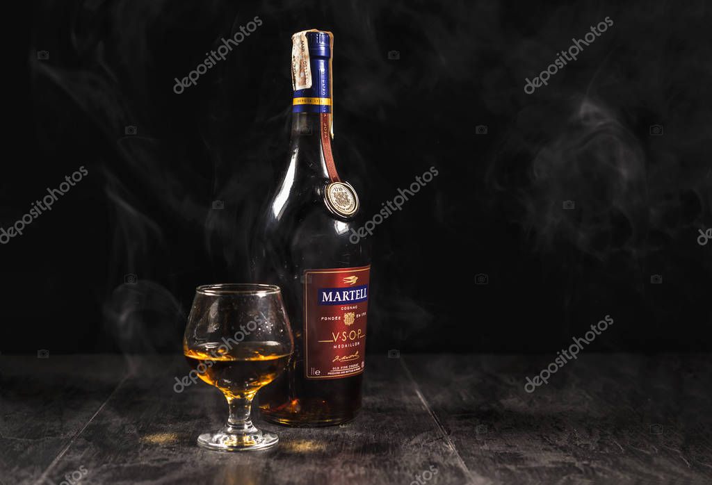 Kiev, Ukraine - 07 November 2018. Bottle of Martell Cognac, a brand founded in 1715 by Jean Martell, now owned by French wines and spirits conglomerate Pernod-Ricard.