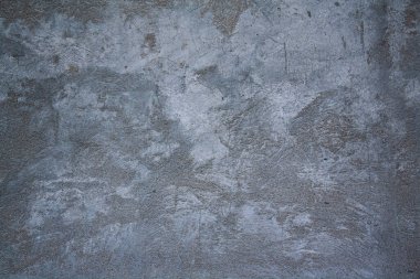 Pürüzlü ve çizikli eski gri beton duvar dokusu. soyut somut arkaplan.