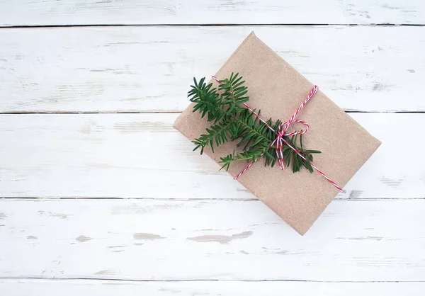 Box Gift Sprig Coniferous Plant White Wooden Background — Stock Photo, Image