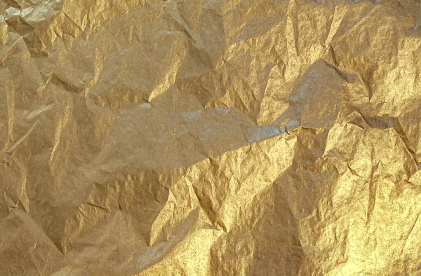Papel Dourado Amassado Perto — Fotografia de Stock