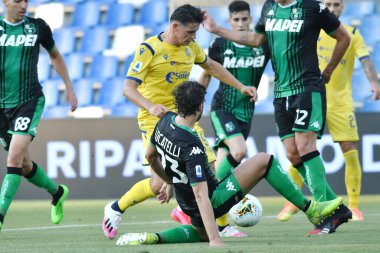 Mariusz stepinski verona ve Manuel locatelli Sassuolo, Hellas Verona 'ya karşı 28 Haziran 2020' de İtalya 'nın Reggio Emilia kentinde - LM / Alessio Tarpini