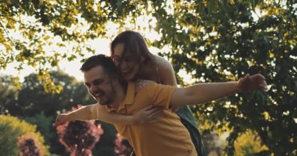 Happy Couple Having Fun Outdoors Slow Motion Smiling Man Woman — Stock Video