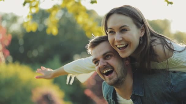 Happy Couple Having Fun Outdoors Slow Motion Smiling Man Woman — Stock Video