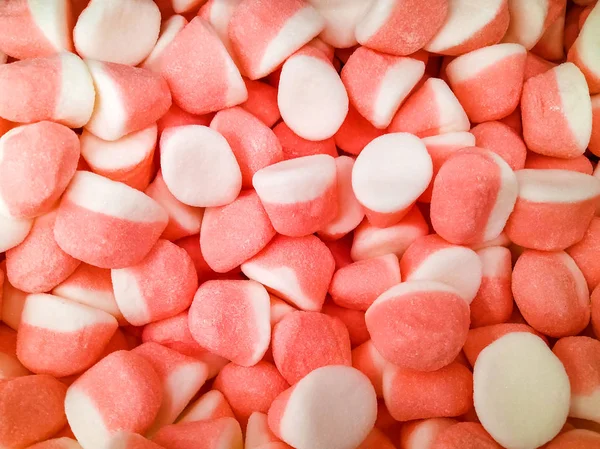 Pink sweet chewy candies background — Stock Photo, Image