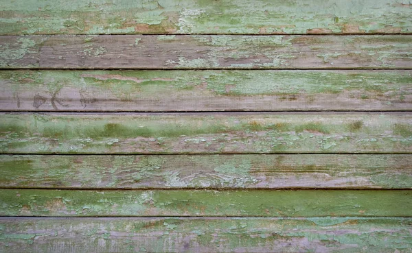 Yeşil boyalı ahşap arka plan dokusu. Closeup — Stok fotoğraf