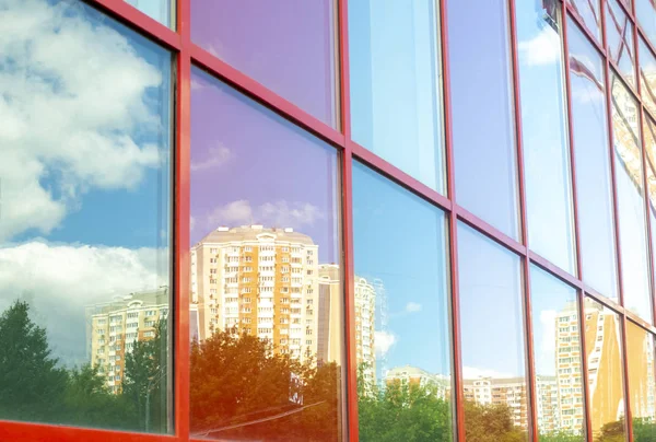 Buildings reflected in the glass of another building — Stock Photo, Image