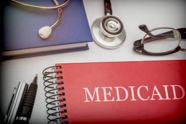Başlıklı kırmızı kitap medicaid tıbbi malzeme, kavramsal görüntü ile birlikte