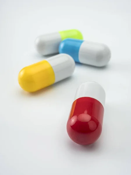 Several Capsules Different Color Isolated White Background Conceptual Image — Stock Photo, Image